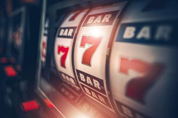 Wild Coaster slot interface on pamanslot mobile showing five reels with carnival-themed symbols
